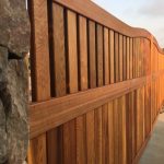 Side view of wooden entry gate.