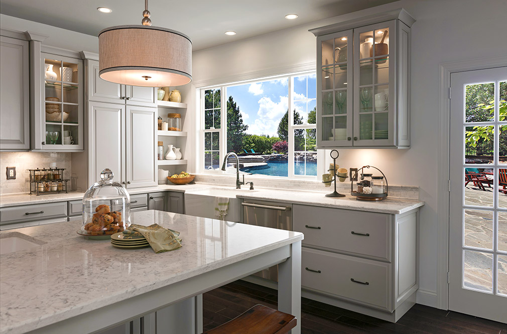 Interior kitchen looking out windows.