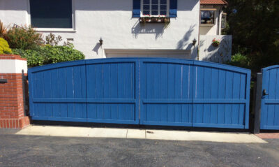 Blue gate in front of house