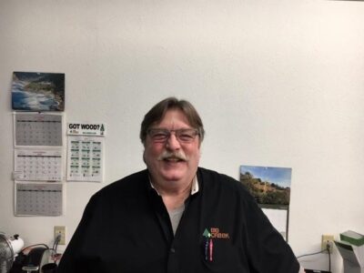 Man standing in front of a white wall