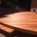 Curved redwood deck.