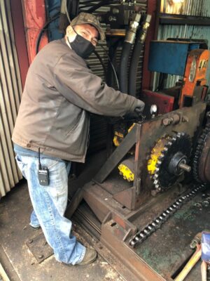 Man working on mechanical equipment