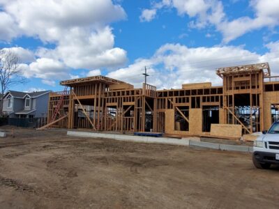 Building that is framed out of wood being built