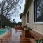 Free-standing redwood planter boxes.