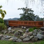 Redwood deck wall.