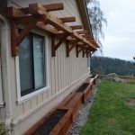 Redwood arbor and planter boxes.